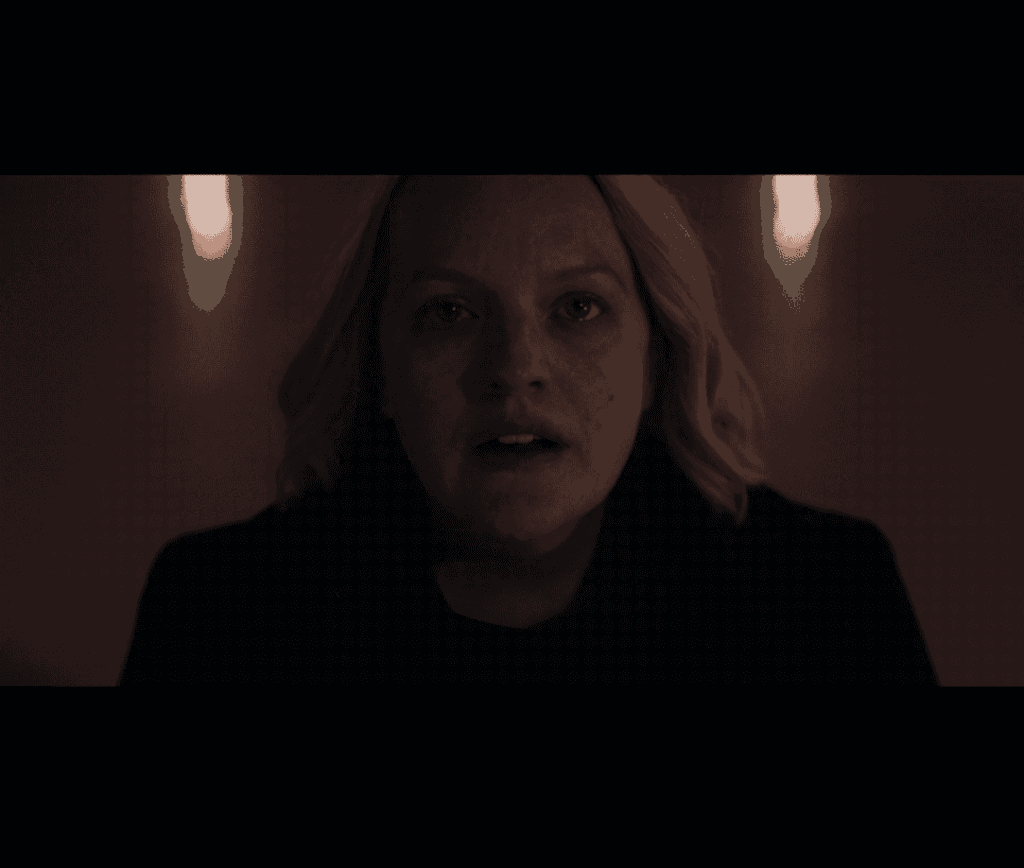 June Osborne watches the plane full of commanders explode.