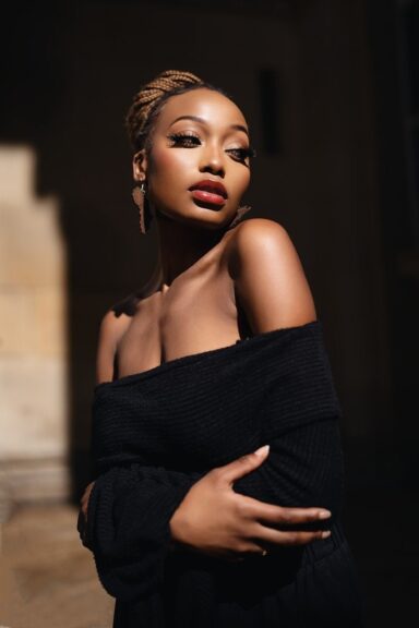 Inclusive fashion meets street style in this urban editorial shot, featuring a bold, gender-neutral outfit with sleek, minimalist flair and moody elegance.