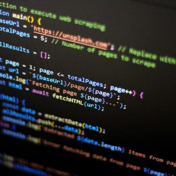 cyberattack, computer screen with a bunch of code on it