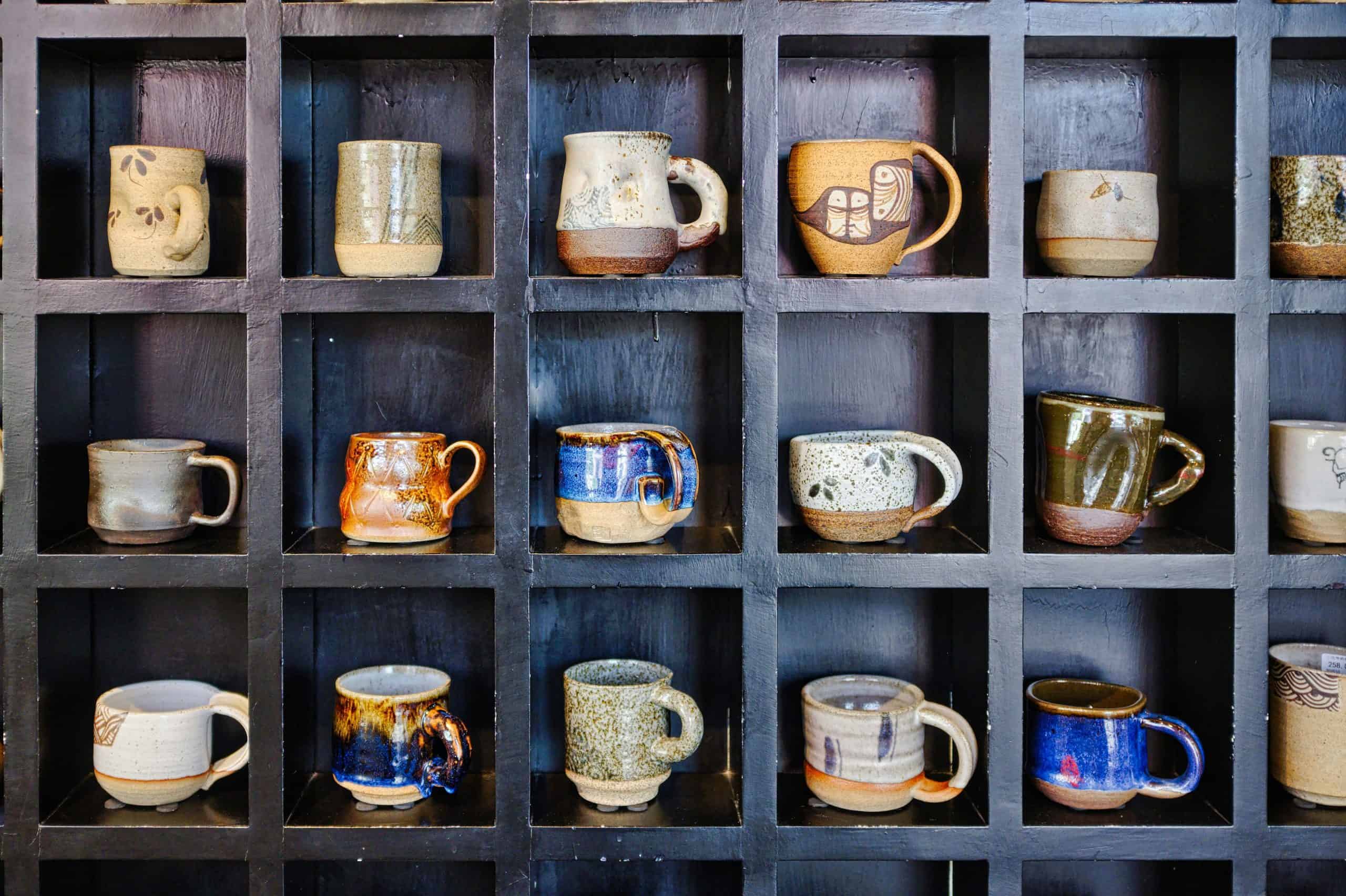 Image of assorted mugs on shelves