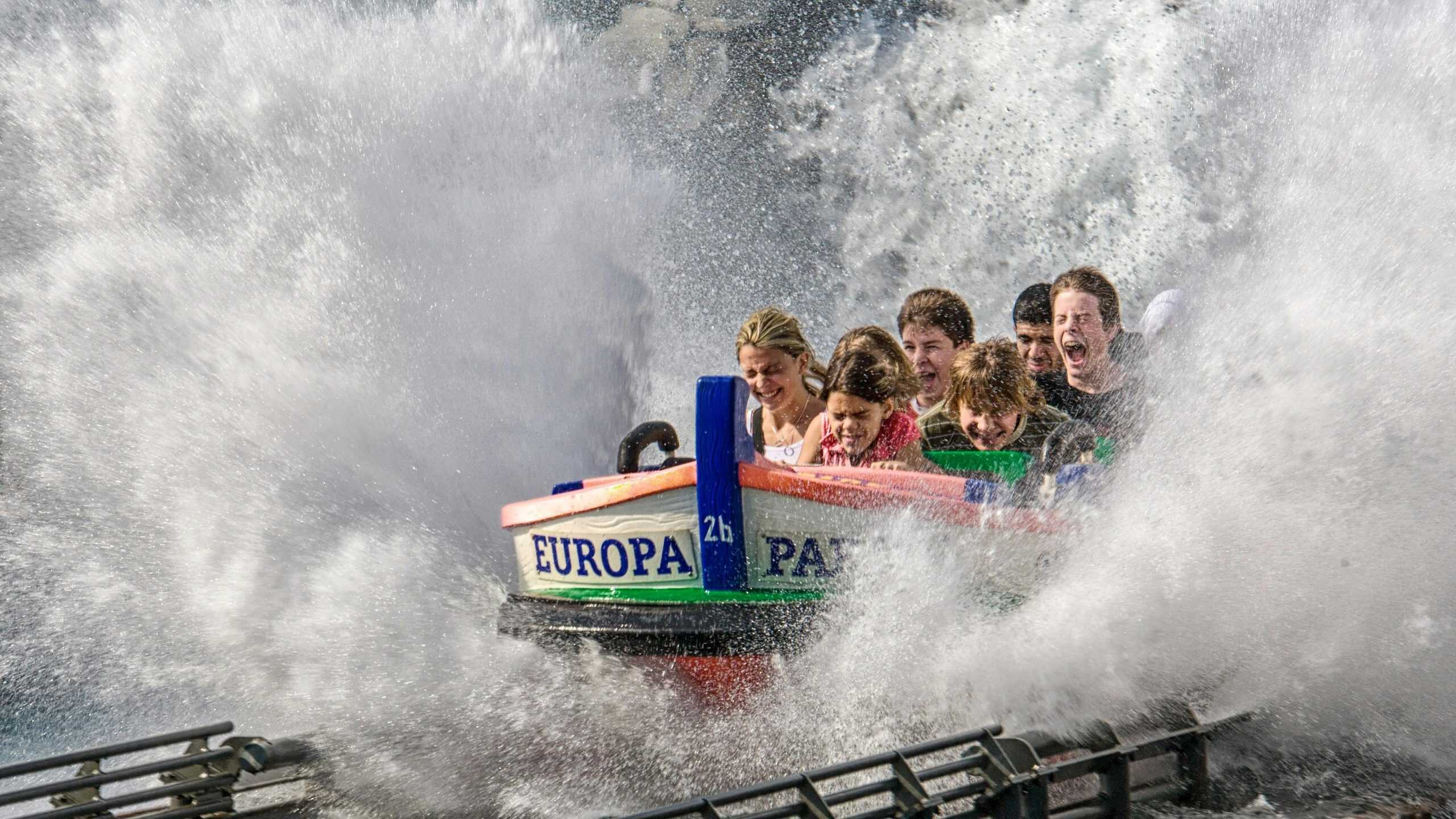 Park goers on a water ride at Europa Park in Germany.