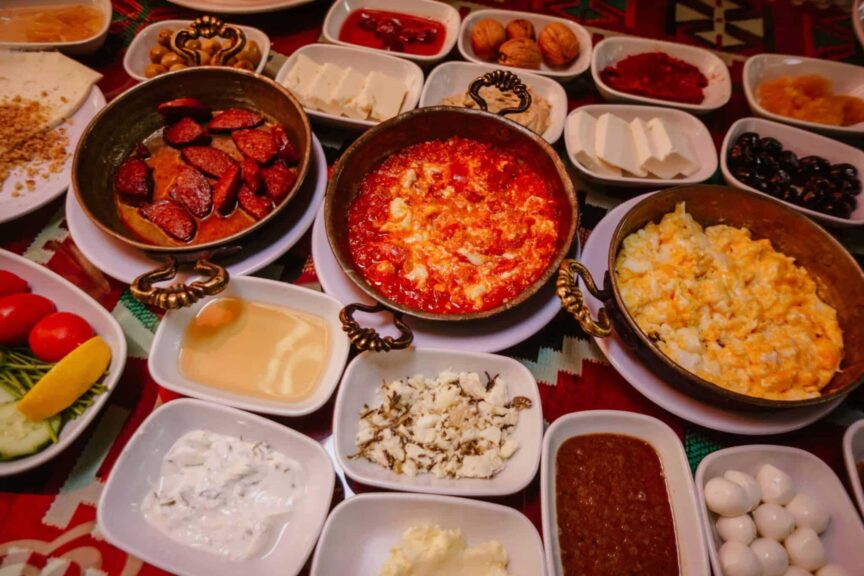 Bowls filled with different foods on a table. Global flavor