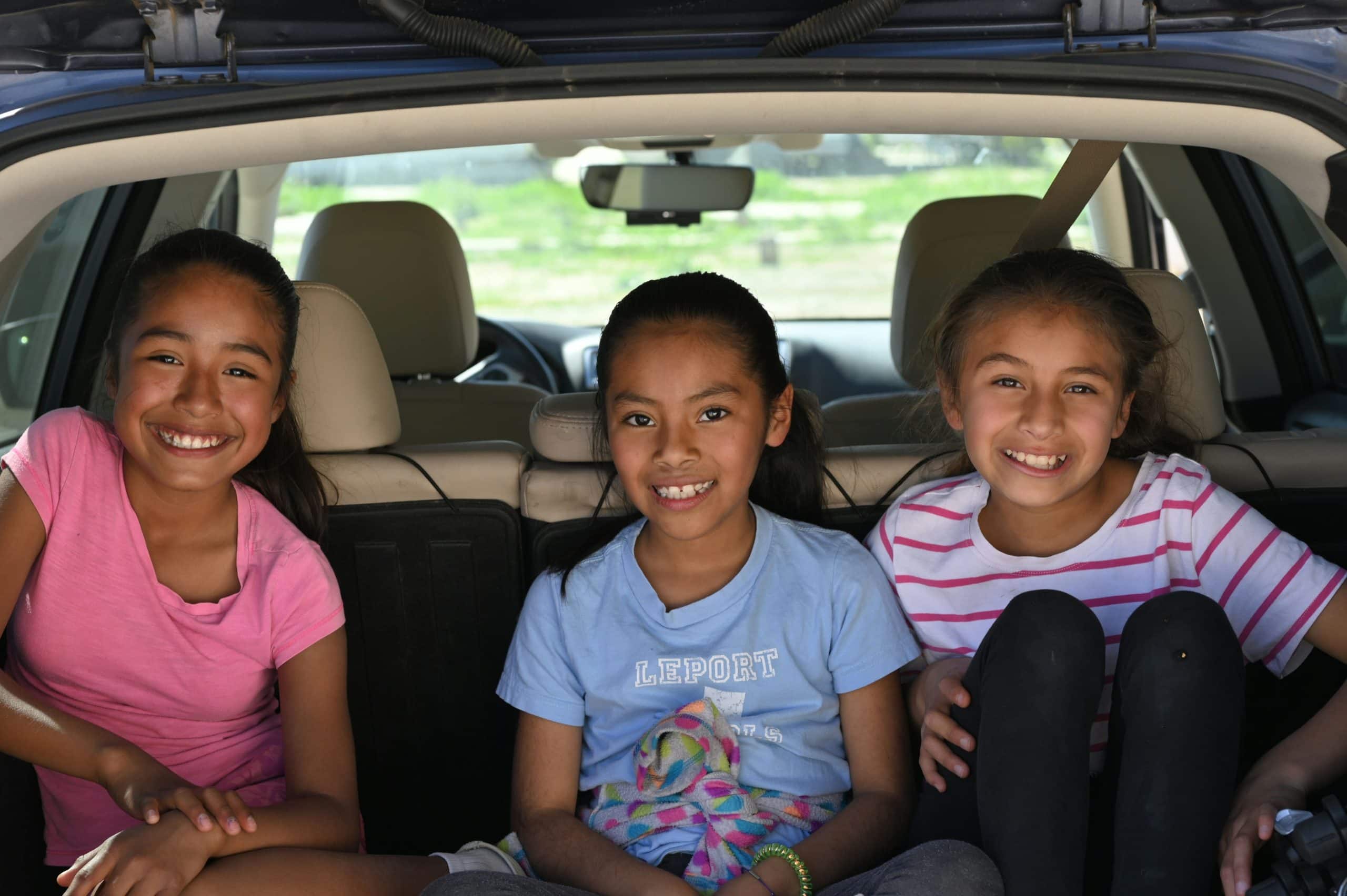 Photo of three girls in a car