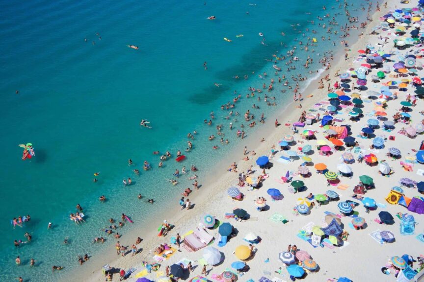 Beach filled with people, beach bacteria