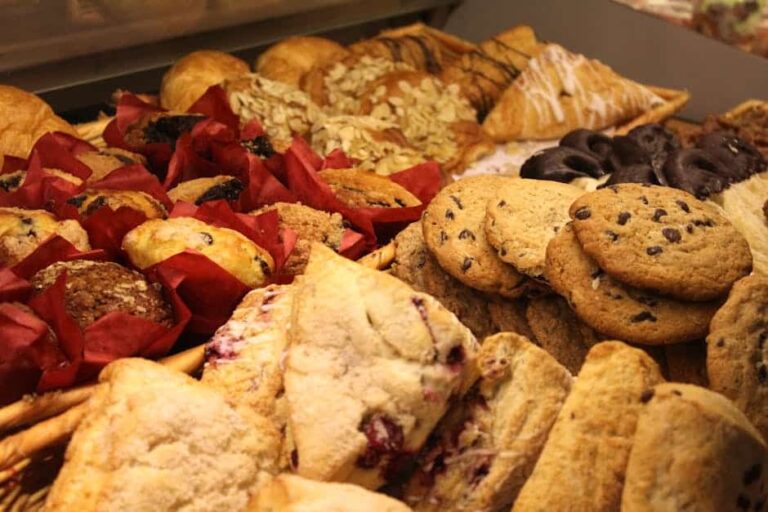 After-School snack, A delicious assortment of baked goods including cookies, muffins, and pastries ideal for breakfast or snack.