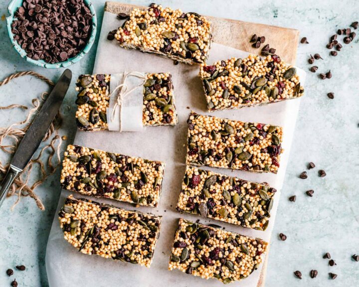 Top view of homemade protein bars with seeds and chocolate chips. Image credit: by Ella Olsson via Pexels