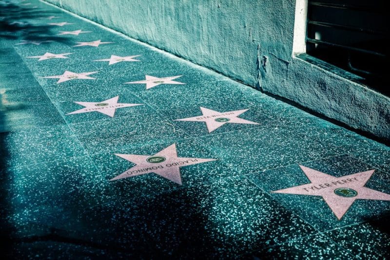View of Hollywood Walk of Fame with stars on the sidewalk in Los Angeles, California.
