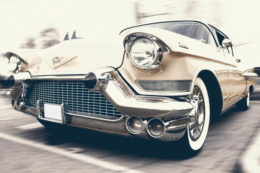 A classic Cadillac captured in motion, showcasing its vintage charm and sleek design. Cadillac El Dorado