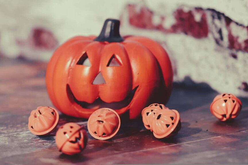 small town, halloween, jack-o-lantern, pumpkin decoration, spooky, autumn decor, halloween party, carved pumpkin, halloween mood, fall holiday, halloween tradition, orange pumpkin, halloween symbols, halloween bells, trick or treat, scary fun, festive decor, rustic background, halloween vibes, october 31st, seasonal celebration, spooky cute, halloween scene, creepy-cute, fall festival, eerie atmosphere