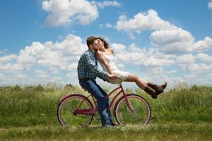 happy valentines day, couple, romance, bike, bicycle, meadow, field, happy, romantic, kiss, affection, together, lovers, man, woman, relationship, young couple, love, outdoors, portrait, marriage myths, divorce