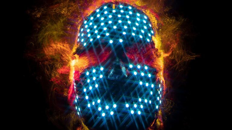 Abstract image of a digital skull with glowing neon lights, representing technology and innovation.
