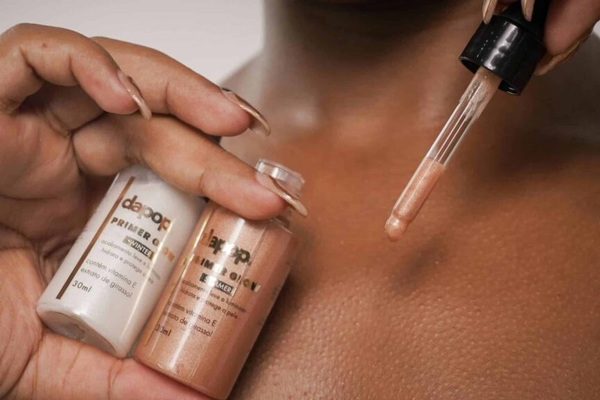A detailed view of primer being applied to skin with a dropper. hydrating primers, mature skin
