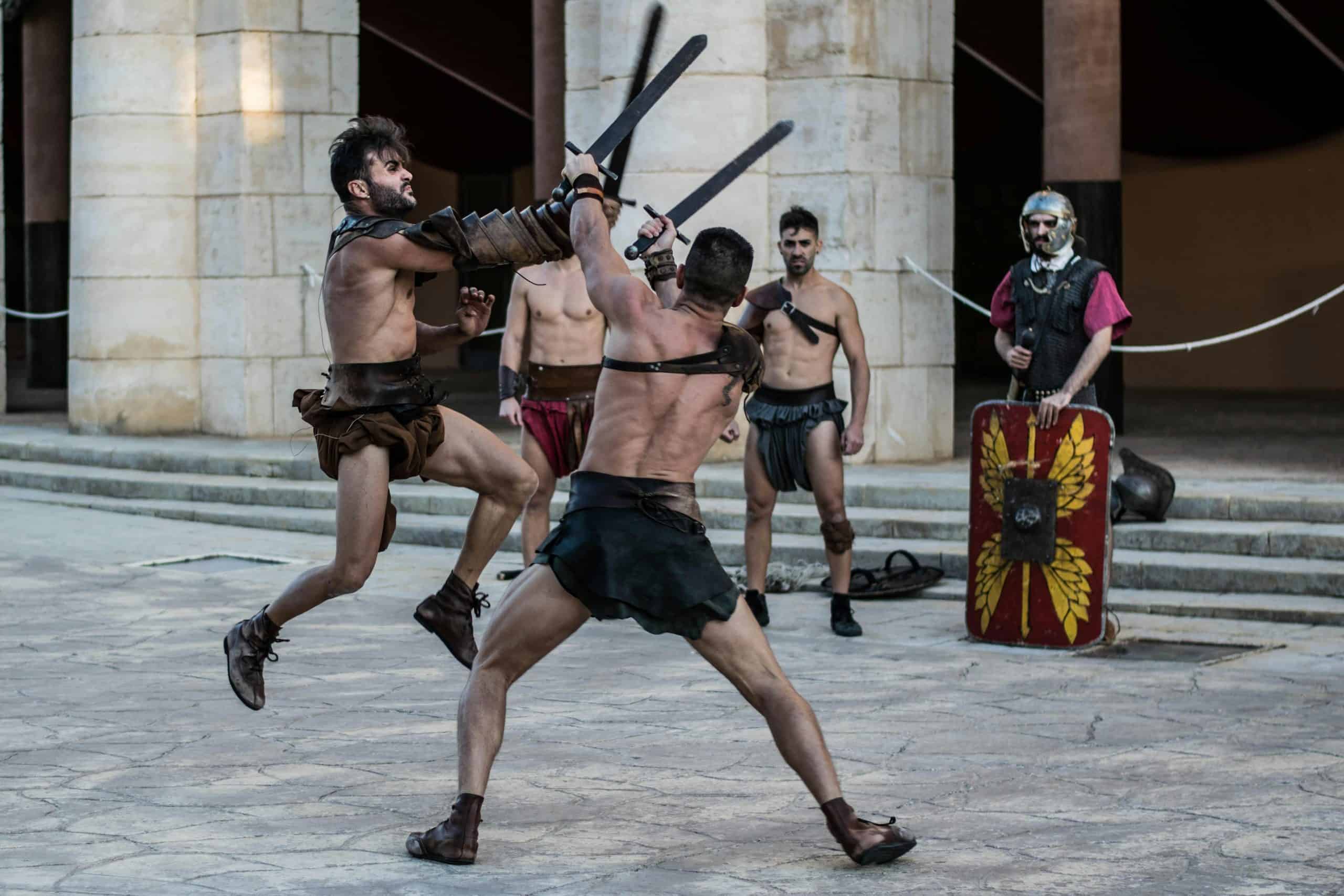 Intense scene of gladiators engaging in combat with swords in an ancient-style arena, daily devotion