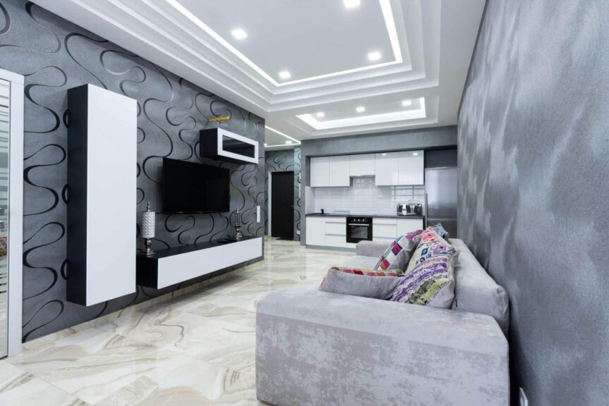 This photograph features an apartment in which tile is a design element. Tile drenching can be a compelling design technique.