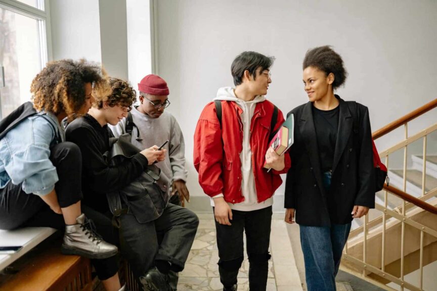 This is a photograph of students in a stairway. The beginning of the school year is an exciting time for high school fashion.