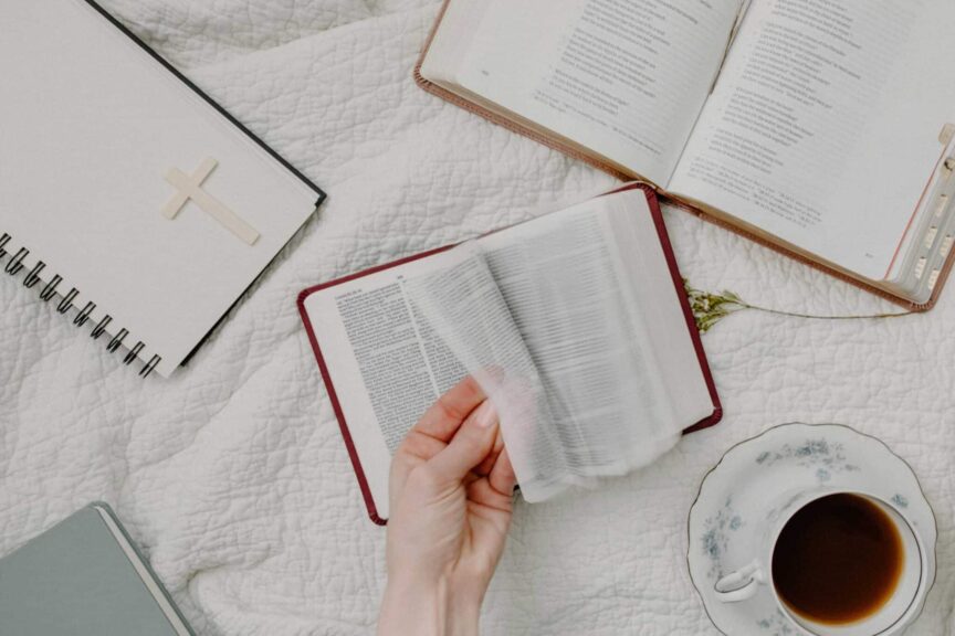 A cozy setup of Bible reading with a cup of coffee, evoking a peaceful morning routine, daily devotion