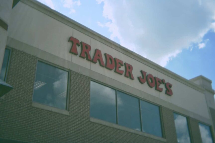 A trader joe's store with the sky in the background