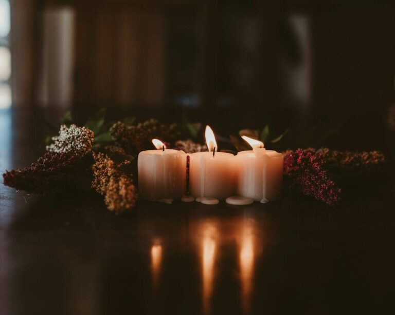 white candles on brown wooden table, making your own
