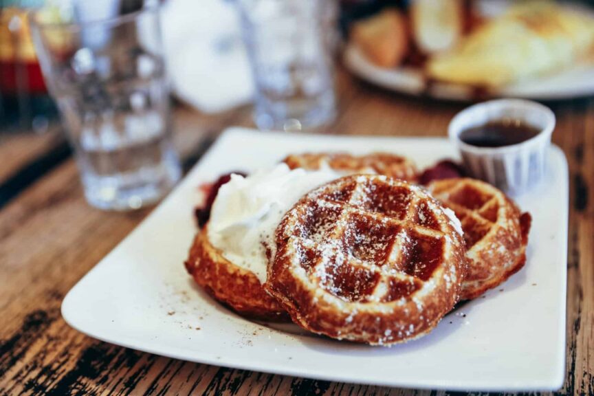 This is a photograph of waffles. Waffles and other breakfast items can be great on chilly days.