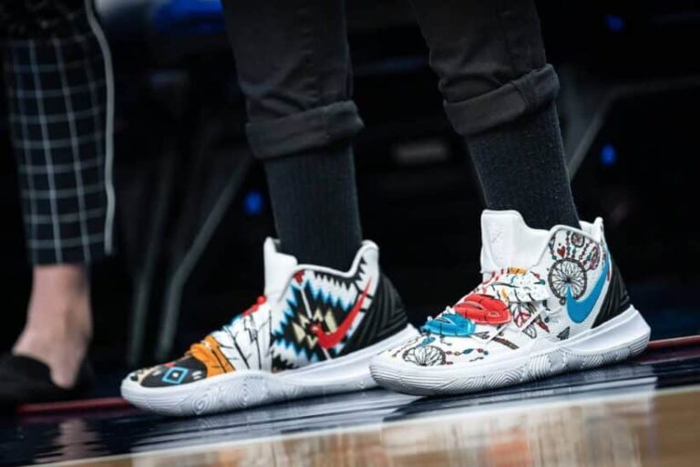 This photograph features shoes worn by Seimone Augustus customized for Native American Heritage Night. The shoes are decorated with Native American motifs. Native American designers are being highlighted this year., Indigenous