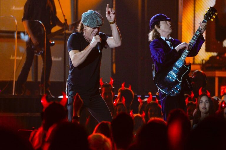 AC/DC lead vocalist Brian Johnson (left) and guitarist Angus Young performs "Rock or Bust" and "Highway to Hell" at the 57th annual Grammy Awards at the Nokia Theatre.