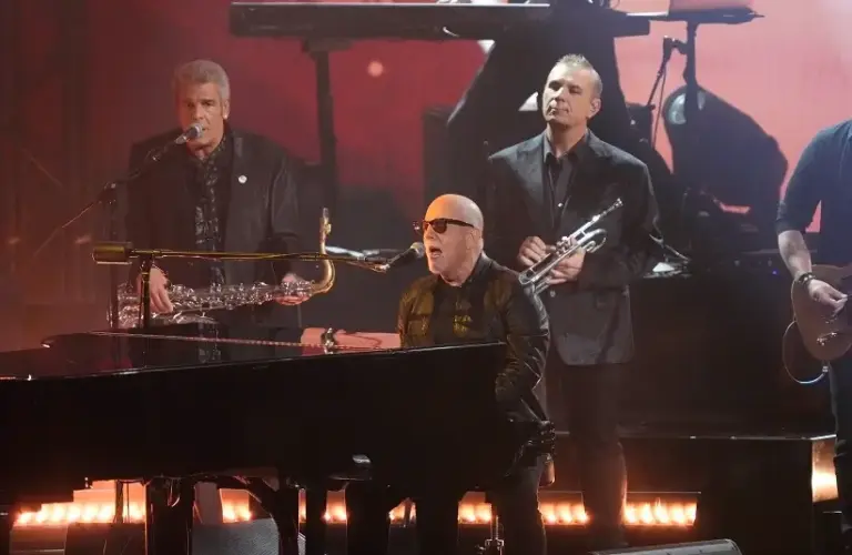 Today's epic earworm is from Billy Joel, pictured here performing at the 66th Annual Grammy Awards.
