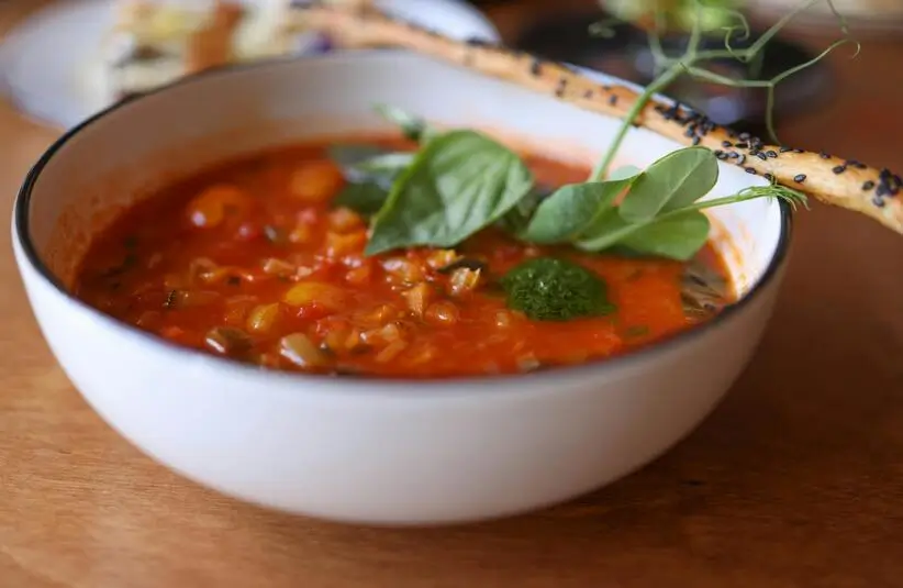 Bowl of tomato soup is a great vegan soup idea for winter