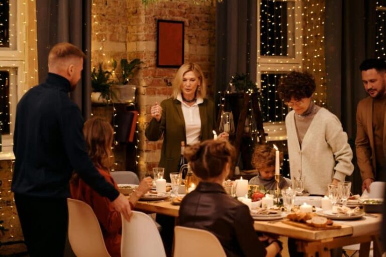 This is a photograph of a family celebrating a holiday. Holiday plans can be a topic of conversation for couples.