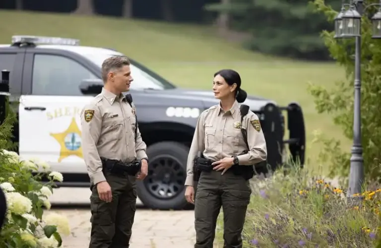 Morena Baccarin and Matt Lauria in Sheriff Country (2025). Sheriff Country is one show from CBS that has been renewed.