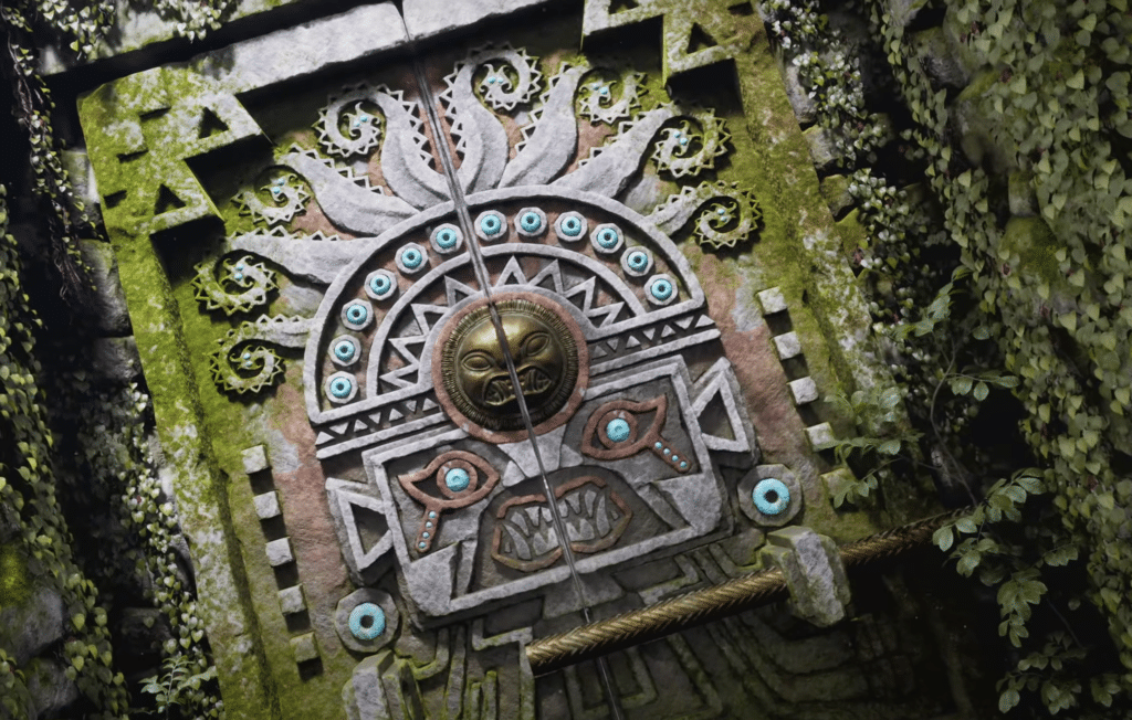 An ancient door being unlocked by a puzzle being completed.