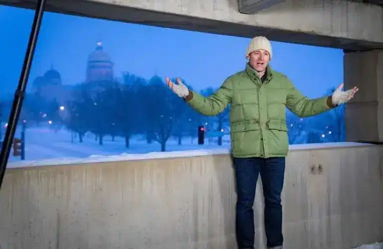 Tony Dokoupil of CBS News reports from the Capitol parking ramp as blizzard conditions blast Des Moines, Friday, Jan. 12, 2024.