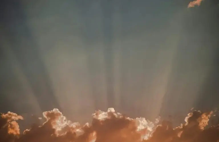blue sky, white clouds, and sun rays, daily devotion