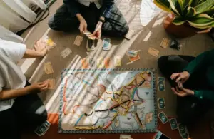 Best Travel Board Games Group playing Ticket to Ride/ Board Games v Video Games: The Brutal Truth