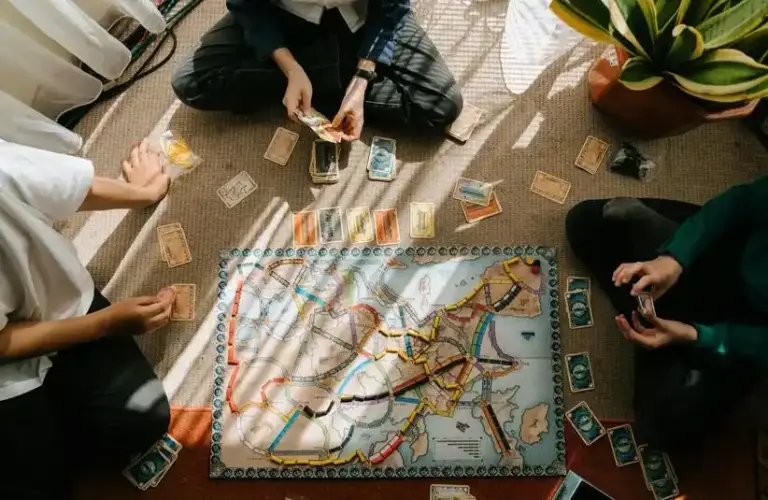Best Travel Board Games Group playing Ticket to Ride/ Board Games v Video Games: The Brutal Truth