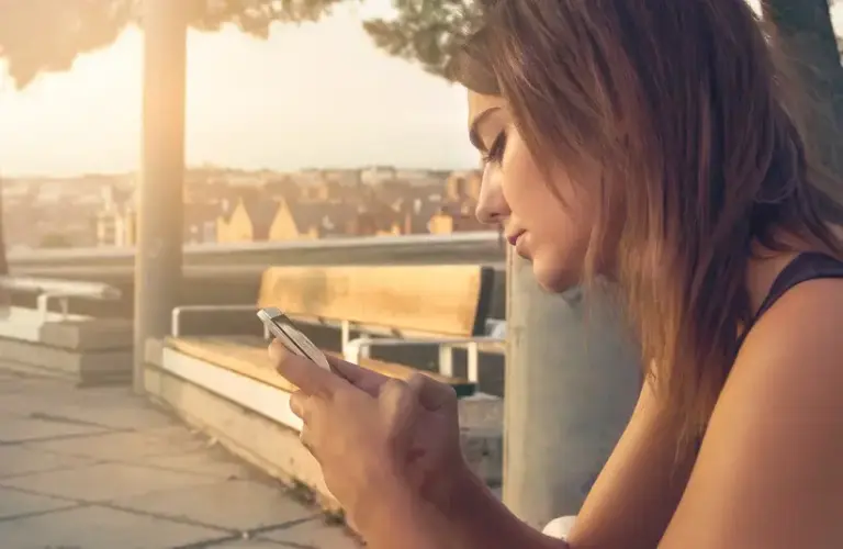 a woman using a cell phone, mental health, AI