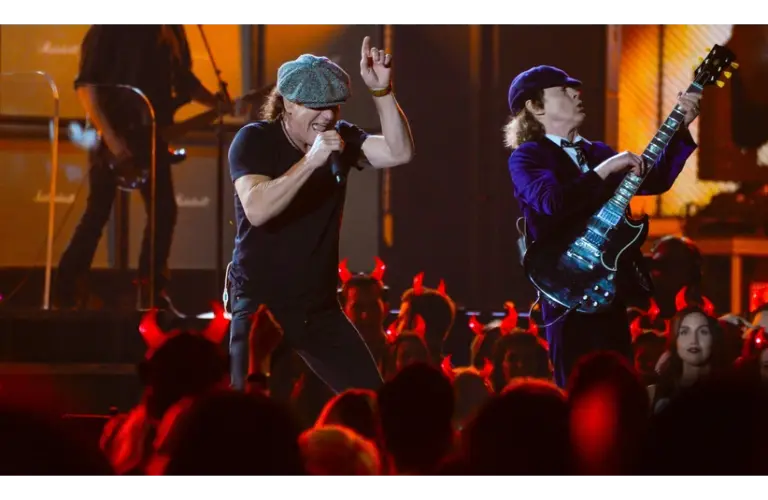 AC/DC lead vocalist Brian Johnson (left) and guitarist Angus Young performs "Rock or Bust" and "Highway to Hell" at the 57th annual Grammy Awards at the Nokia Theatre. The fans were thunderstruck.