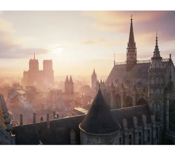 Aerial view of a historic European city skyline at sunrise, with intricate gothic architecture, pointed towers, and a warm, serene glow from the sun. Assassin's Creed: Unity, Courtesy of Ubisoft.