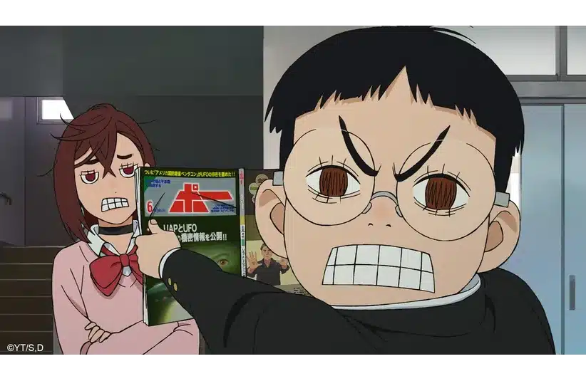 Dan Da Dan Okarun is showing Momo a magazine