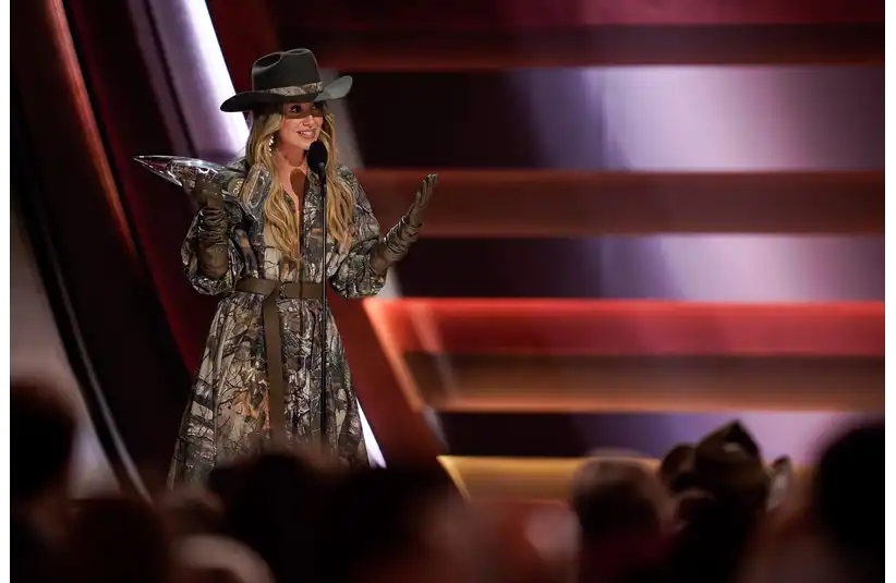 Lainey Wilson accepts the Entertainer of the Year Award during the 59th Annual CMA Awards at Bridgestone Arena in Nashville, Tenn., Wednesday, Nov. 19, 2025.