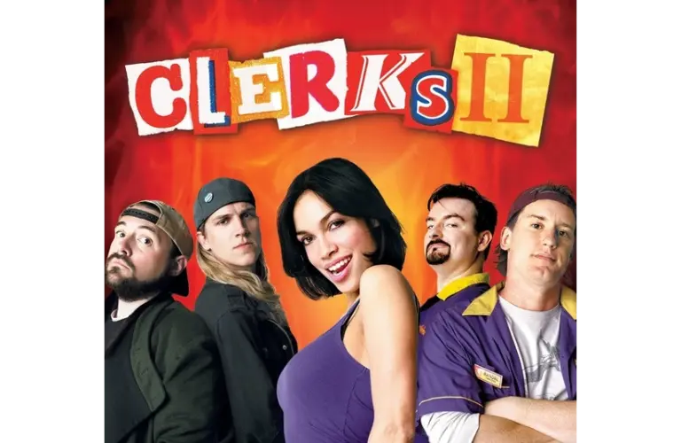 Five people stand against a fiery orange background beneath the title "Clerks II" in bold letters. The mood is playful and comedic.