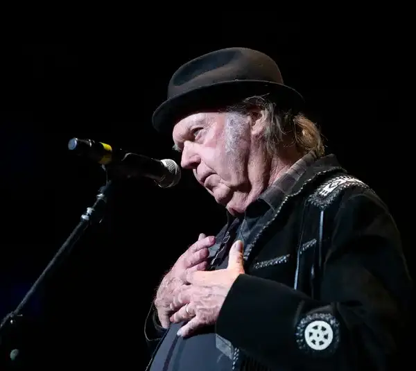 Neil Young helps to induct his longtime collaborator and friend Spooner Oldham into the Memphis Music Hall of Fame during a ceremony. Young played his first show 63 years ago today on January 31, 1963.