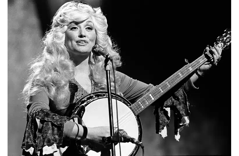 Dolly Parton performs during the CMA Awards show at the Grand Ole Opry House Oct. 11, 1976.