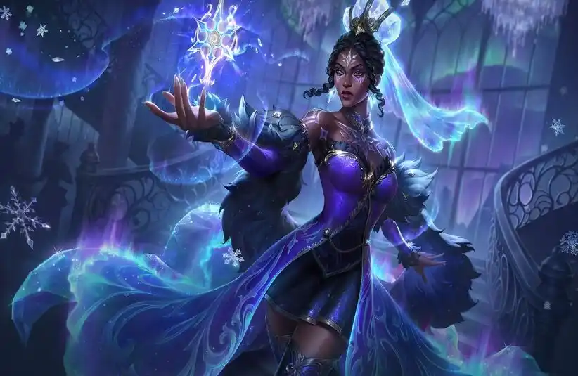 Prestige Winterblessed Mel in an ornate purple dress conjures a glowing ice crystal. She stands confidently in a mystical, snowy setting with swirling lights.
