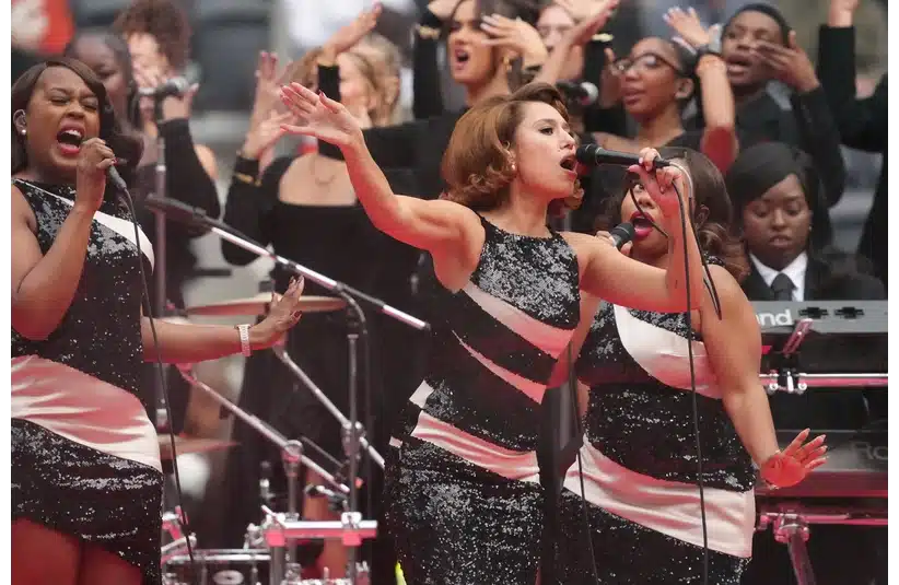 Recording artist Raye performs during halftime of an NFL International Series game between the Minnesota Vikings and the Cleveland Browns at Tottenham Hotspur Stadium.