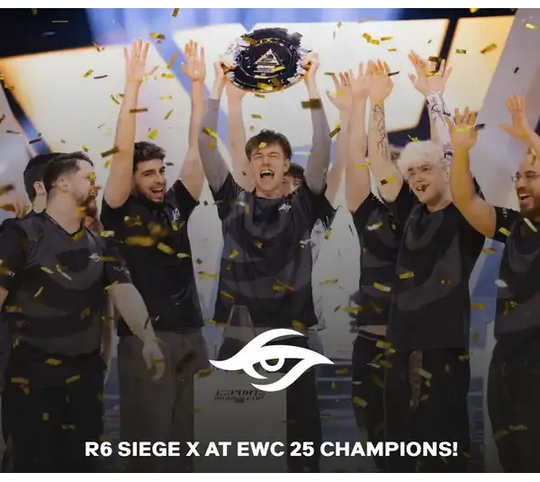 R6 Siege X at EWC 25, celebrating a championship victory on stage with arms raised, surrounded by confetti. Esports events