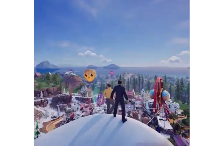 Two figures stand on a snowy hill, overlooking a vibrant amusement park with a Ferris wheel and cheerful hot air balloon under a clear blue sky. Fortnite The Office crossover