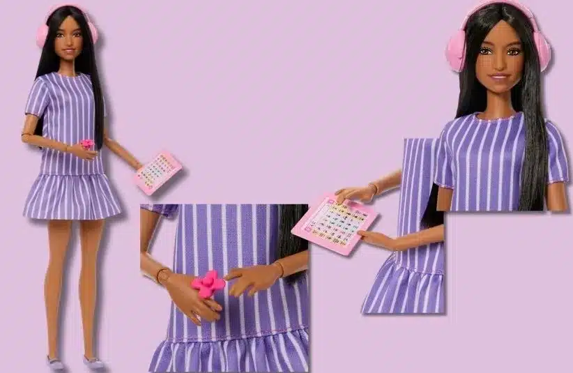 Autistic Barbie has a loose purple pin-striped dress, purple flats, a fidget spinner, tablet, and noise-canceling headphones.