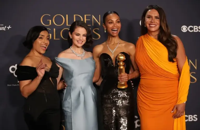 image of Golden Globes nominee Selena Gomez with Karla Sofía Gascón, Zoe Saldana, and Adriana Paz