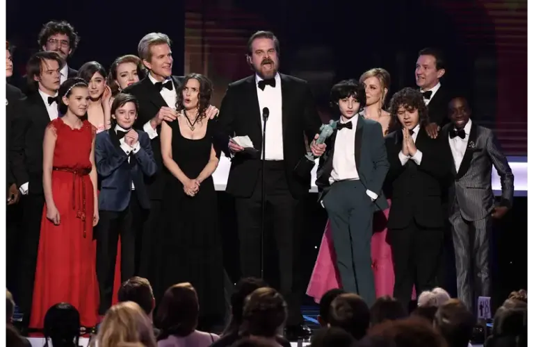The cast of Stranger Things, including David Harbour, Courtesy of © Robert Hanashiro, Robert Hanashiro / USA