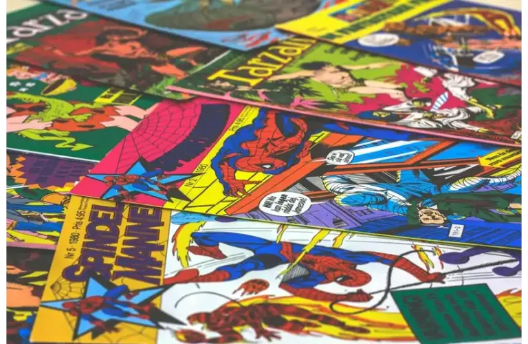 A stack of comics scattered out on display